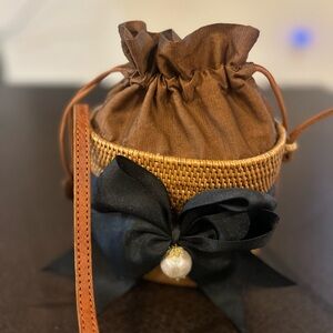 Brown Woven Drawstring Bosom Buddy Bucket Bag with Black Bow
